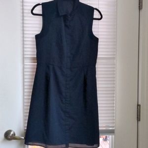Dark blue dress with a self design. US-Size 6